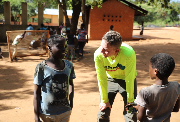 Dan and kids playing soccer