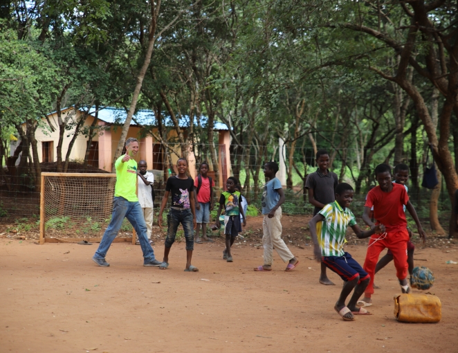 Dan playing soccer