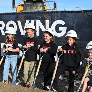 Tipp students with shovels