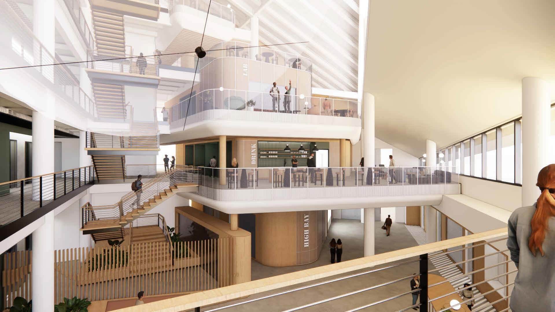 Modern, open-concept interior of a multi-level building with glass railings, natural light, people walking and conversing, and visible staircases connecting different floors.